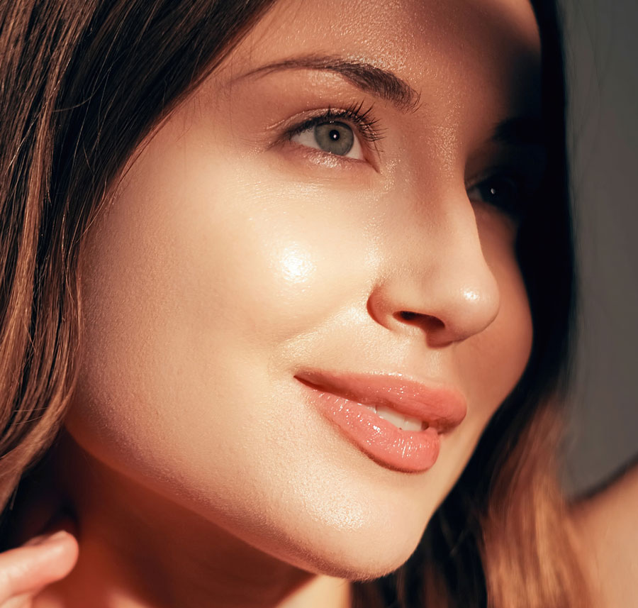 Woman with glowing skin after a detox