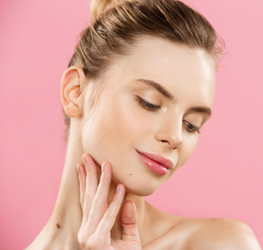 Woman with radiant skin after an Oxygen Facial treatment.