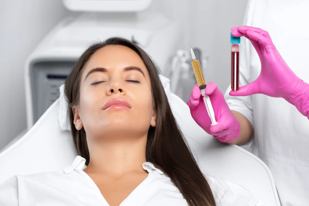 Woman prepared for vampire facial with PRP and blood sample.